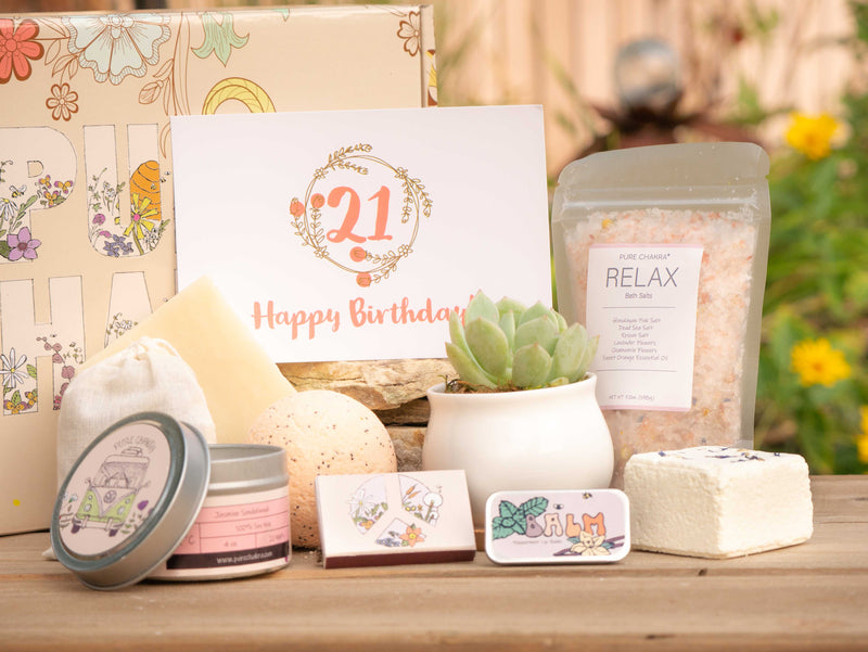 Happy 21st Birthday Succulent Gift Box with relax bath salt, natural soap, bath bomb, shower steamer, candle, custom matches, lavender sachet and lip balm, in front of a decorative gift box